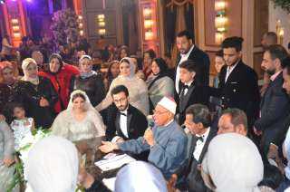 بالصور.. الحكم أيمن دجيش يحتفل بزفاف كريمته «دينا»