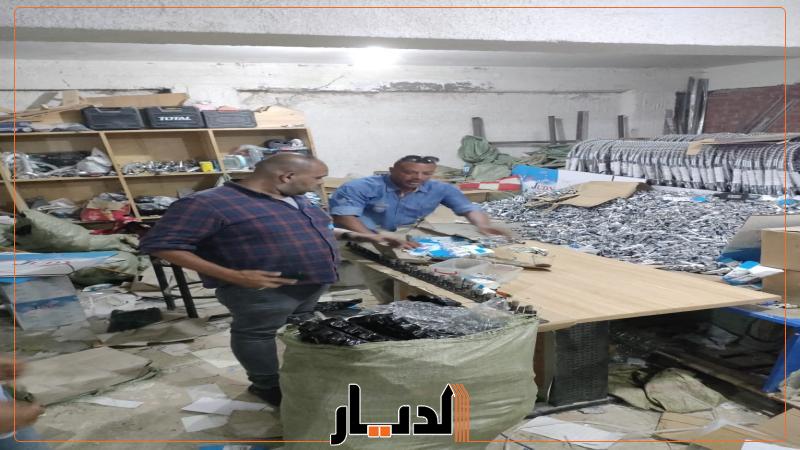 تنفيذي محافظة الجيزة أثناء مداهمة المصنع